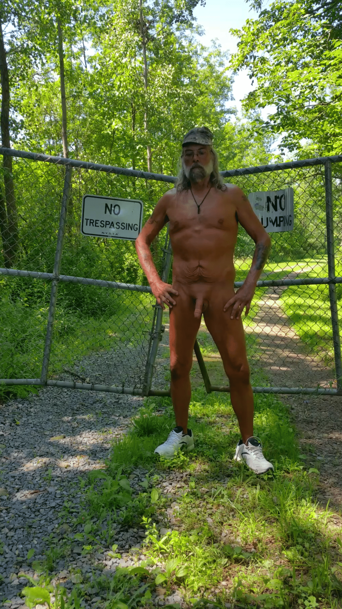 girl naked in public sneakers - Public Nudity: Gate Nude with a View A man stands nude in front of a chain-link fence with a 'NO TRESPASSING' sign, showcasing public nudity and defiance. - Dick Flash Pics