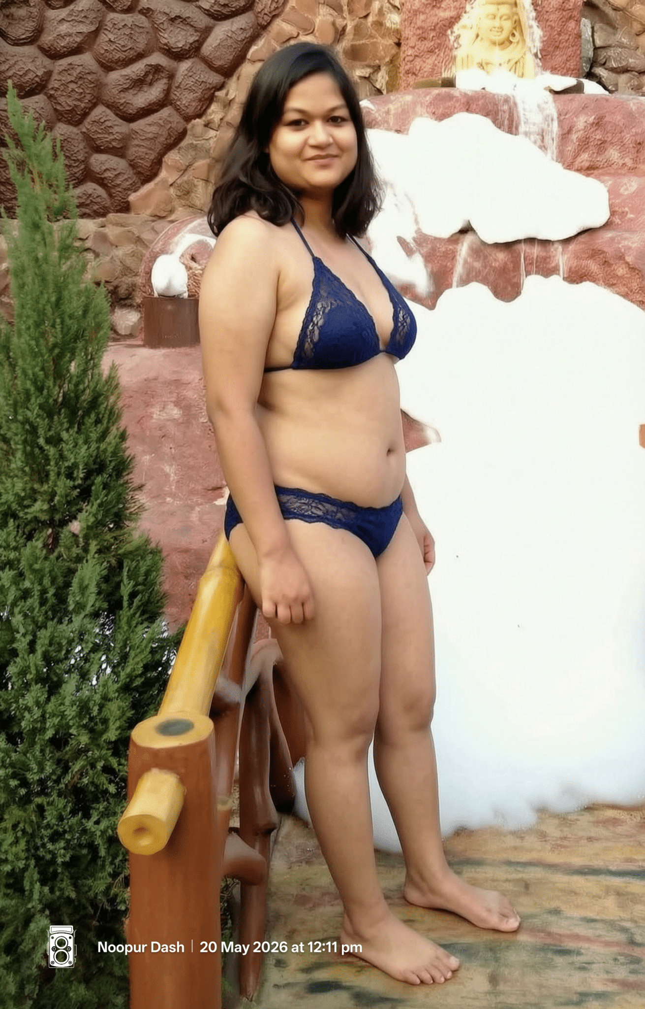 Bitch Flashing Pics: Miss Noopur Dash nick name MAJJA Standing in a park in Blue color Bikini infront of Artificial Snow fall pic clicked by MAJJA’s Own Brother Bijay Dash During Summer vacation
