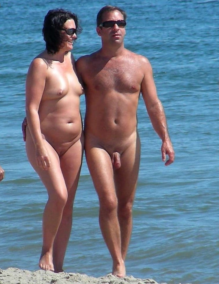 nude gorgeous ebony amateur - Couple Enjoying Nude Beach Day A couple stands nude on a beach, enjoying the sun and water. No sexual activity, just natural nudity in a public setting. - Hotwife Pics