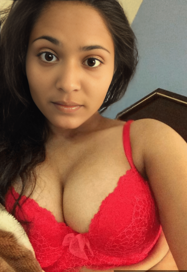 Boobs Flash Pics: Tamil Girl Flashes Her Boobs in Lace Bra Tamil girl flashes her boobs in a red lace bra, her eyes meeting the camera with a seductive gaze, creating a scene of anticipation and desire.