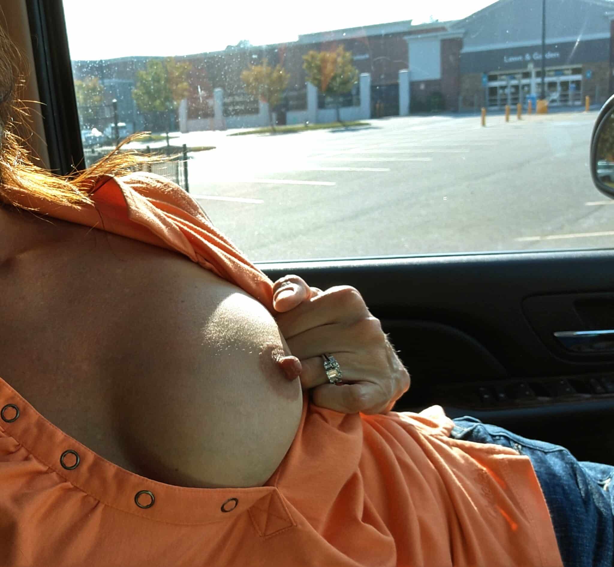 candid public see through clothes teens - Walmart Parking Lot Flashing: A Bold Display of Public Nudity A woman flashes in a Walmart parking lot, exposing her large breasts while pinching her nipple, a bold display of public nudity. - Boobs Flash Pics