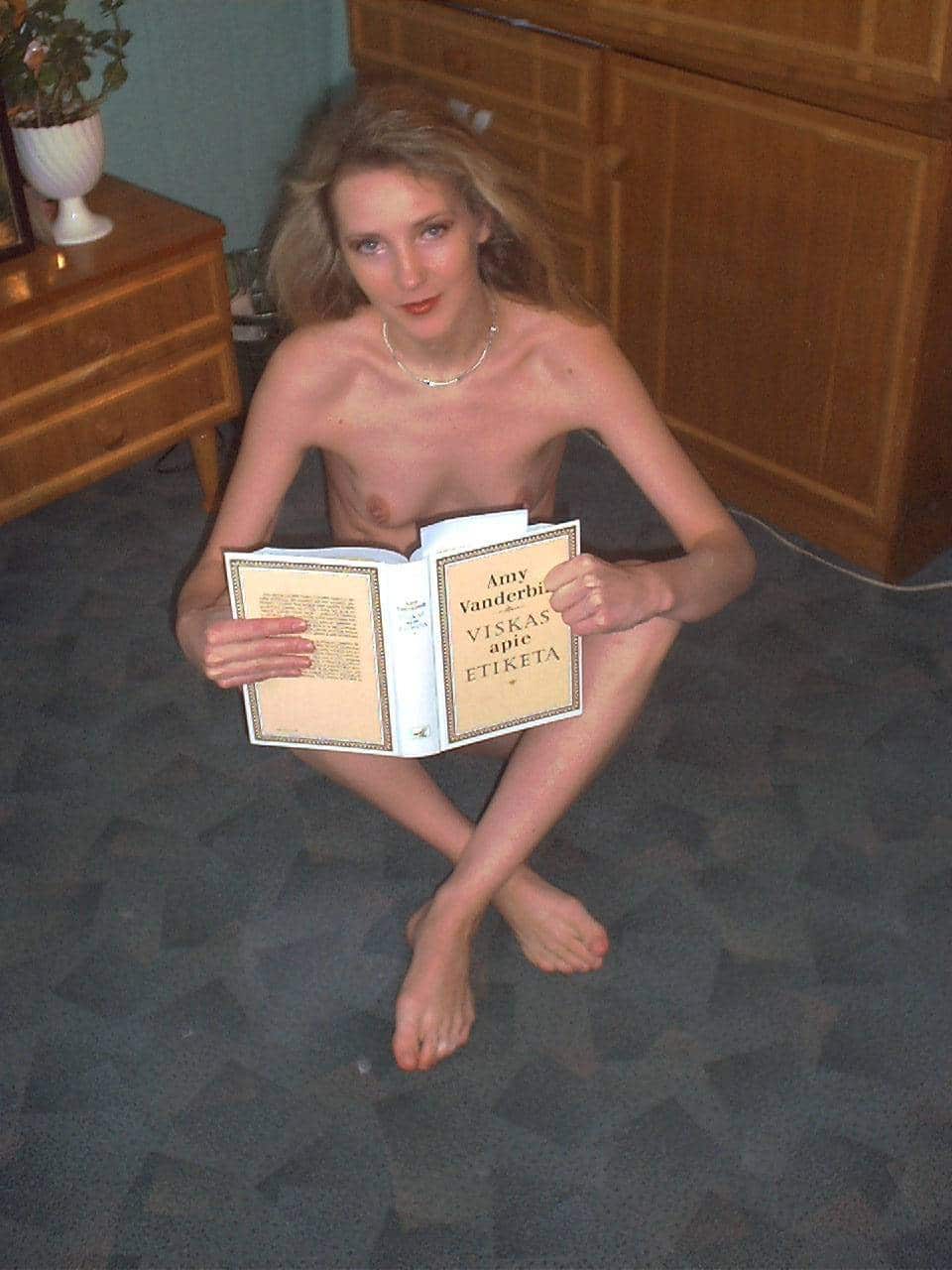 nudist mature candid - Lithuanian Vitalija: Mature Flashing Pics A mature woman flashes in a bedroom setting, holding a book in front of her nude body, with a neutral expression and direct gaze. - Hotwife Pics