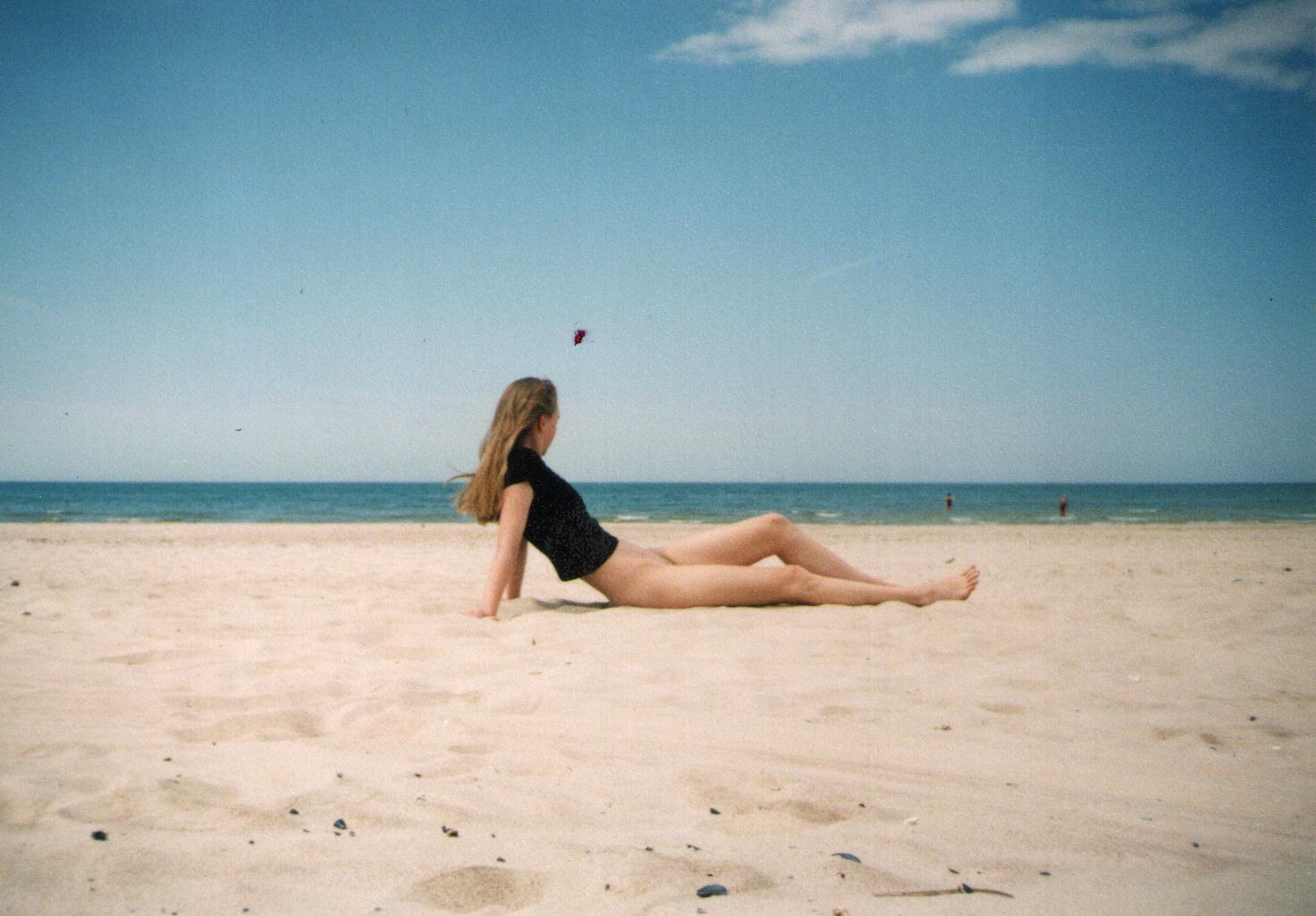 Hotwife Pics: Lithuanian Vitalija’s Afternoon at Palanga Beach Lithuanian woman enjoys public nudity on Palanga beach, captured in a moment of quiet intimacy.