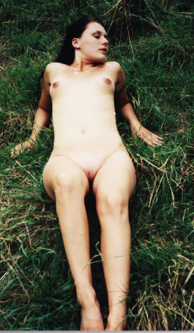 Hotwife Pics: Lithuanian Teen Sonata: Public Flashing in Tall Grass Lithuanian teen Sonata lies nude in tall grass, flashing her body, embracing public nudity and the thrill of being seen.
